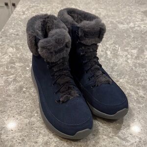 New, never worn Skechers faux fur lined boots.